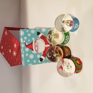 4 miniature snow globes